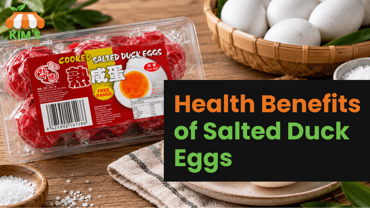 Realistic horizontal image of salted duck eggs in red packaging, surrounded by fresh duck eggs, salt, greenery, and rustic wooden textures.