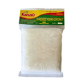 Shredded coconut in a clear package labeled "Kapuso" showcasing its fine texture and natural color.
