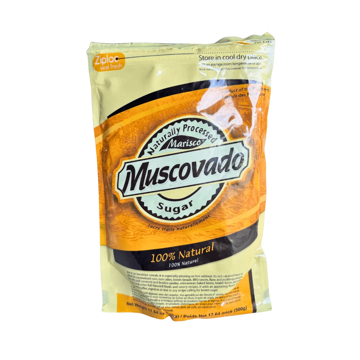 A jar of musovado natural sugar with jalapeño peppers, showcasing the unique blend of sweet and spicy flavors.