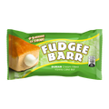 A fudgee bar featuring a rich layer of deluxe cream cheese, showcasing its creamy texture and chocolate coating.