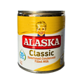 A can of Alaska Classic Sweetened Condensed Filled Milk featuring a vibrant design and nutritional information on the packaging.