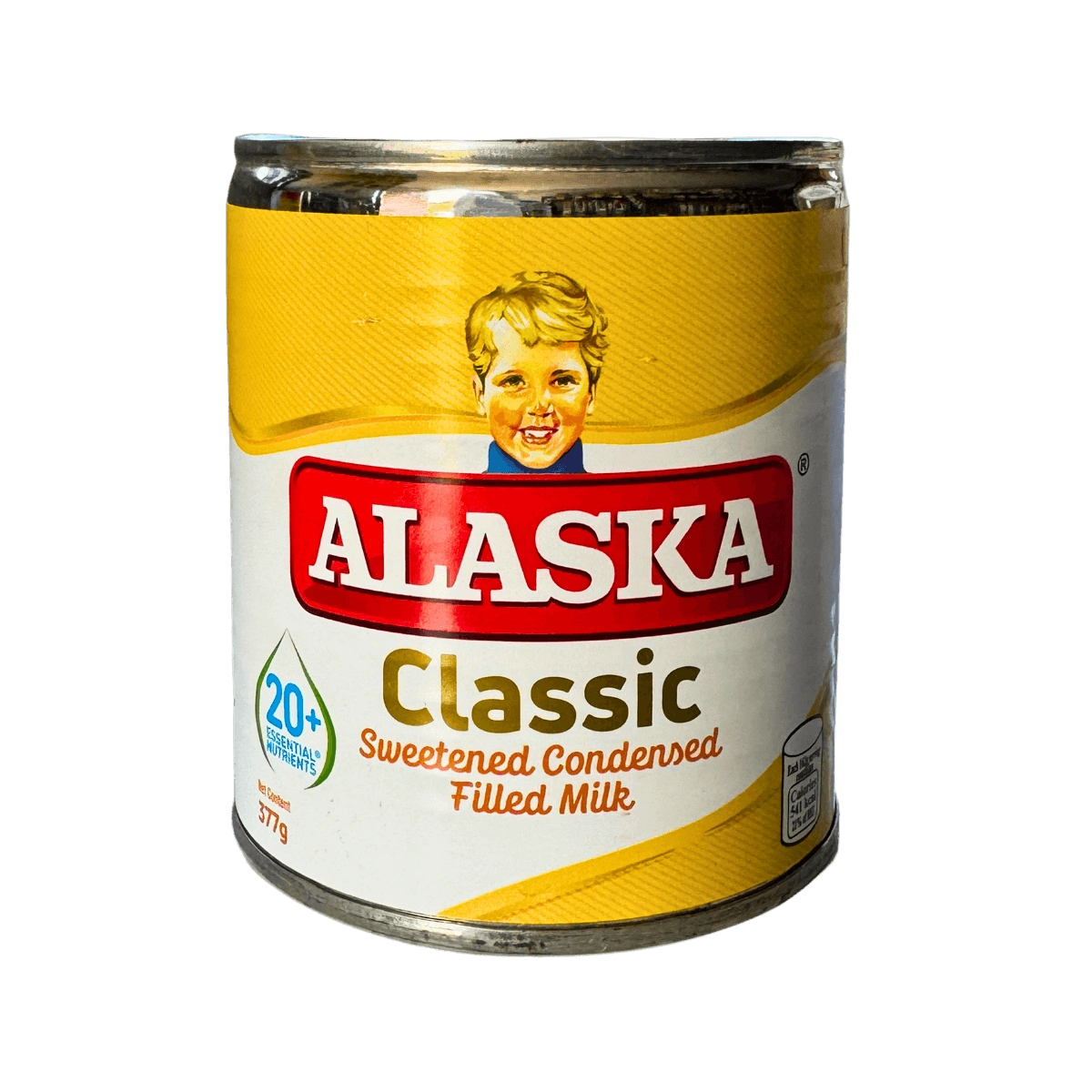 A can of Alaska Classic Sweetened Condensed Filled Milk featuring a vibrant design and nutritional information on the packaging.