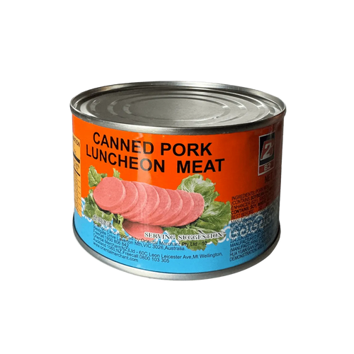 A can of pork luncheon meat displayed against a black background, showcasing its label and packaging design.