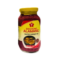 A jar of bagoong alamang, a salted shrimp paste, showcasing its rich brown color and label detailing ingredients.