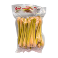 A bag of fresh leeks displayed against a black background, highlighting their vibrant green color and long stalks.