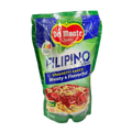 A bowl of Filipino spaghetti topped with a rich tomato sauce and sliced hotdogs, garnished with grated cheese.