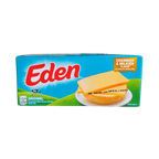 Eden cheese slices arranged neatly on a white background, showcasing their smooth texture and packaging.