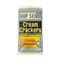 Hup Seng cream crackers displayed in their packaging, emphasizing the product's appealing design and crisp texture.
