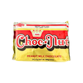 A close-up of Choc Nut, a peanut milk chocolate bar, showcasing its textured surface and packaging design.