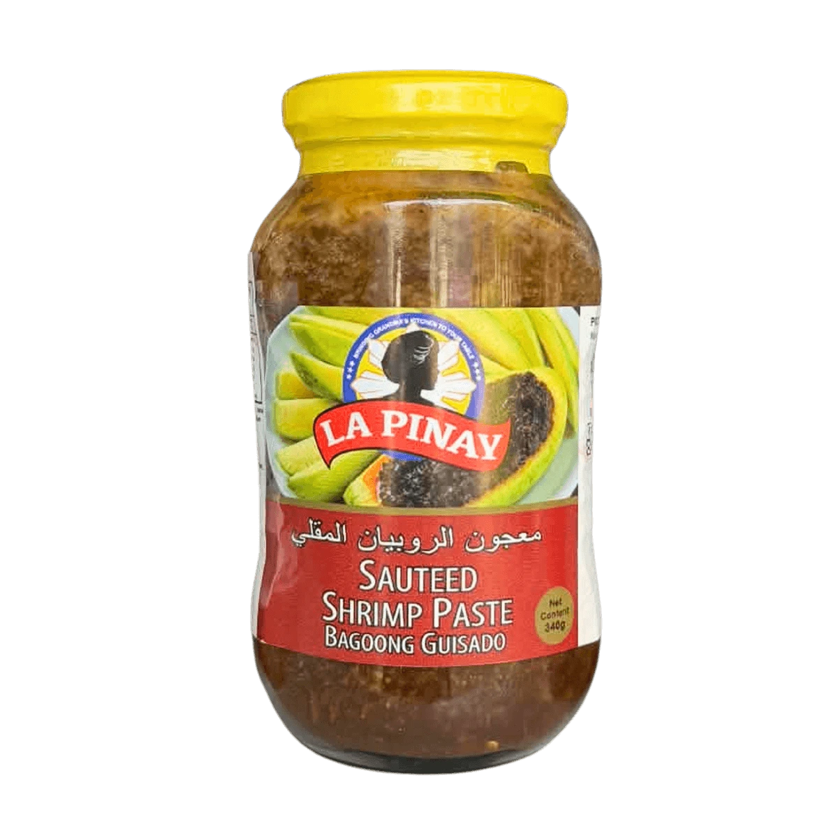 A jar of sauteed shrimp paste sits against a black background, showcasing its creamy texture and vibrant yellow color.