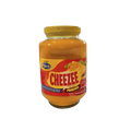 A creamy, golden cheese sauce in a bowl, with a smooth texture and a rich, appetizing appearance.