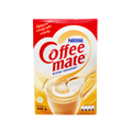A bottle of Nestlé Coffee-Mate coffee creamer, featuring a creamy texture and rich flavor, placed on a kitchen counter.