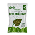 Dried taro leaves arranged in a flat lay, showcasing their textured surface and deep green color.