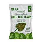 Dried taro leaves arranged in a flat lay, showcasing their textured surface and deep green color.