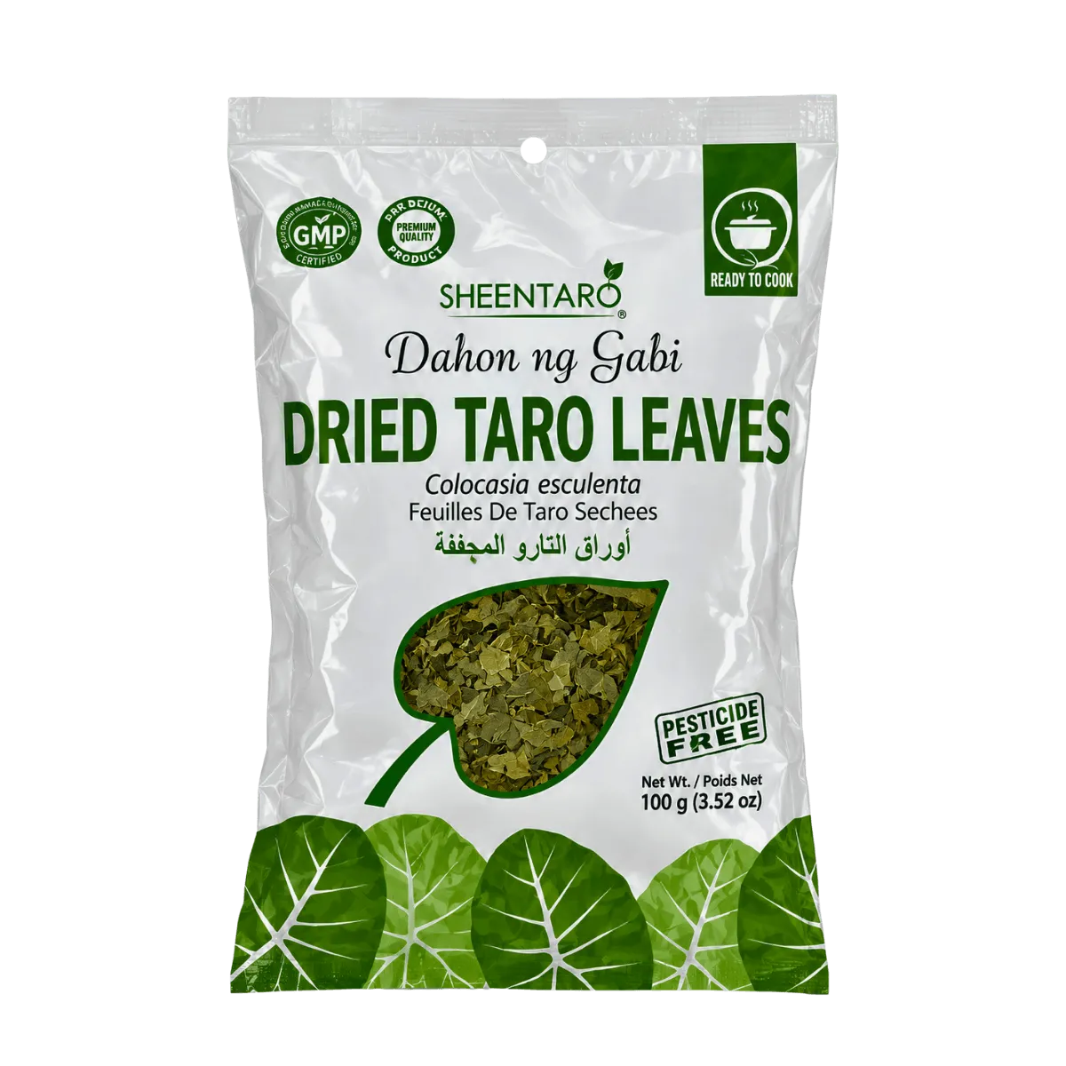 Dried taro leaves arranged in a flat lay, showcasing their textured surface and deep green color.