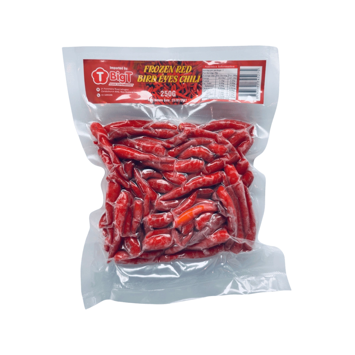 A bag of vibrant red chilli displayed against a solid black background.