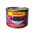 A close-up of temple salted black beans in a bowl, showcasing their glossy texture and rich color.