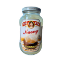 A jar of white jelly, highlighting its bright hue and glossy surface.
